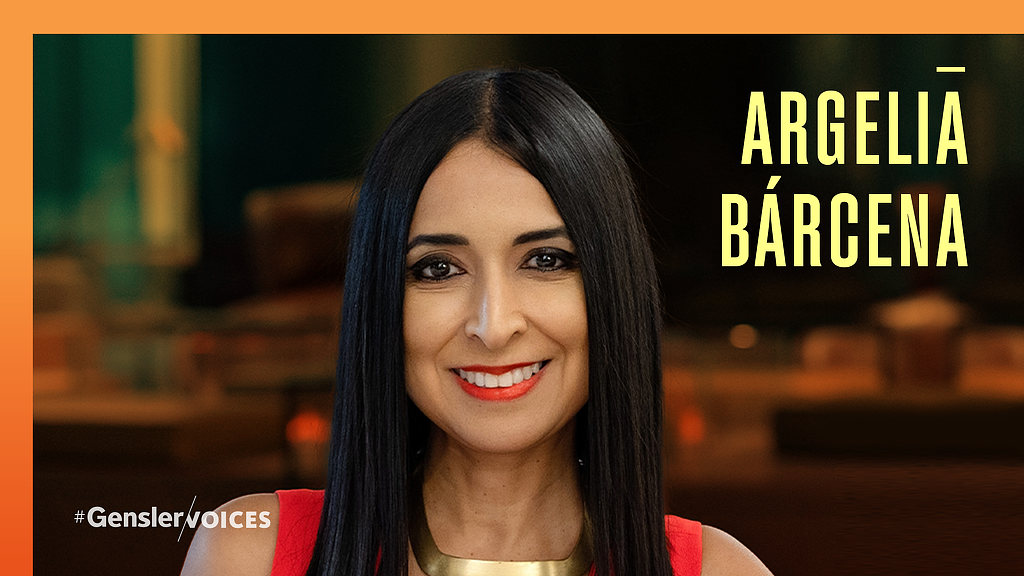 A woman smiling for the camera.